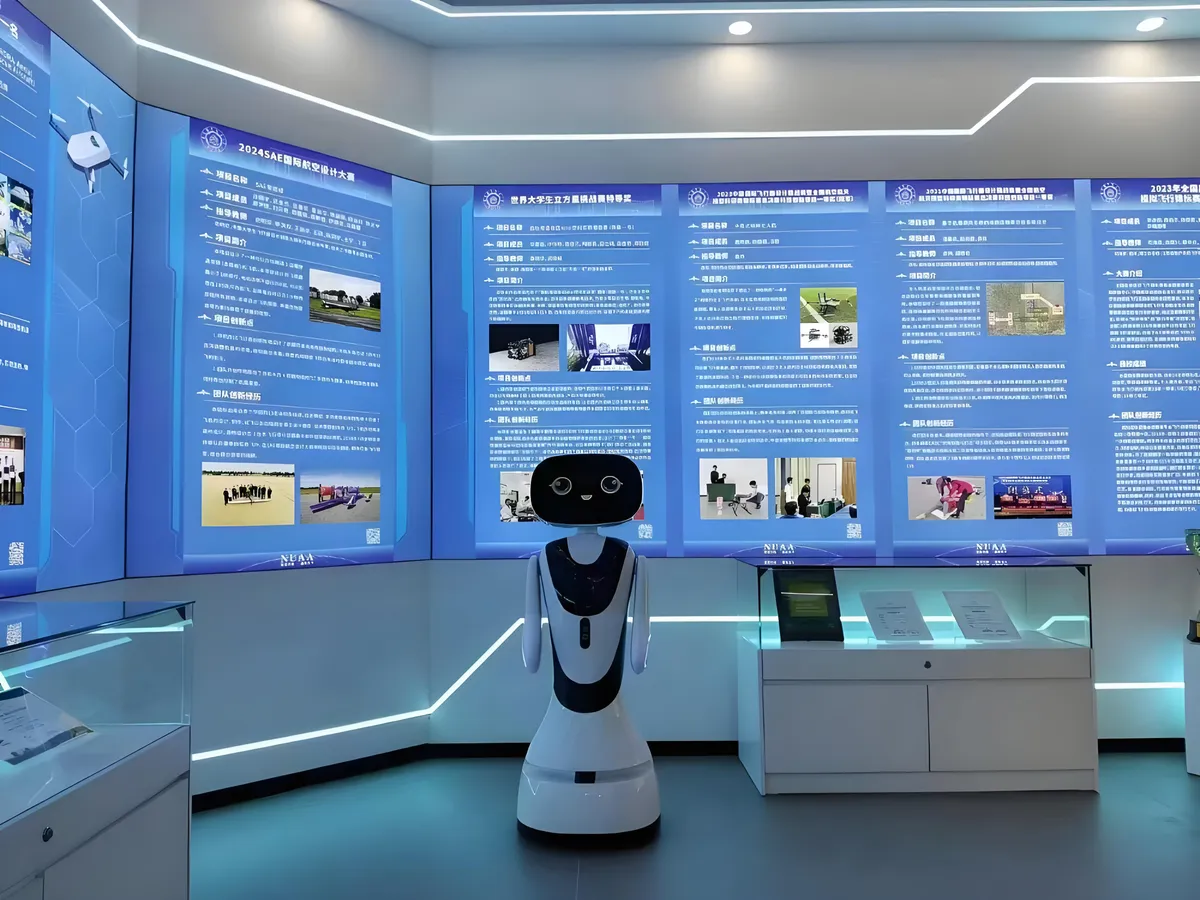 Xiaoyu welcomes guests.jpeg